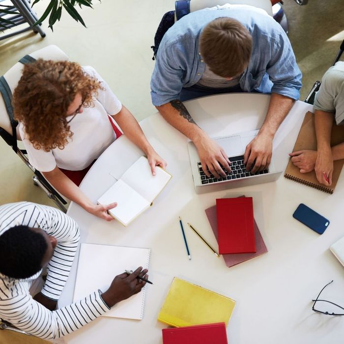 group sitting at a table planning